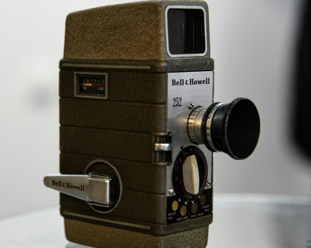 Photo by shraga kopstein an old camera sitting on top of a table