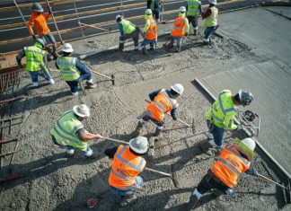 The Role of Safety Protocols in Protecting Workers’ Legal Rights workers in a construction site