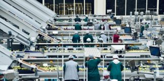 a group of people in a factory