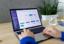 SEO Strategies That Help Ecommerce Brands Thrive a person typing on a laptop on a table