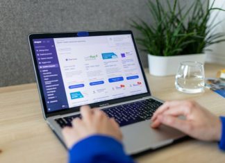 SEO Strategies That Help Ecommerce Brands Thrive a person typing on a laptop on a table