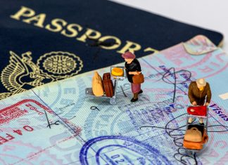 2 men in yellow and black suit action figures