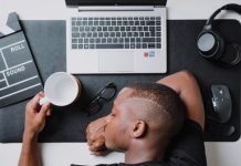 From Burnout to Breakthrough: How CE Courses Can Reignite Your Passion for the Profession a man sitting at a desk with a laptop and headphones