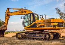 What Criteria Should You Use to Select Heavy Equipment Transport Providers machine, heavy, scoop, industry, equipment, excavator, heavy machine, vehicle, machinery, yellow, brown industry, excavator, excavator, excavator, excavator, excavator