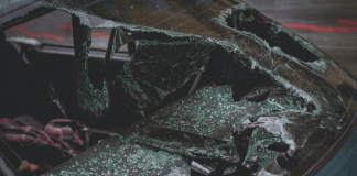 A windshield with broken glass AI-generated content may be incorrect.