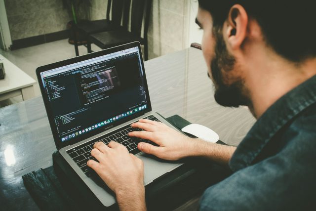Photo by Danial Igdery man programming using laptop