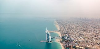 an aerial view of the burj al arab in the middle of the ocean