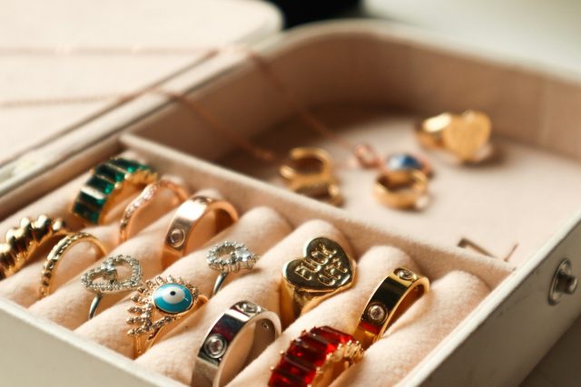Photo by Simran Sood a box filled with lots of different types of rings