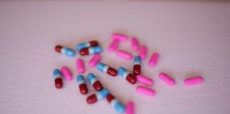 capsules on white panel
