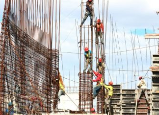 How to Accelerate Recruiting and Fill Empty Construction Roles people working on building during daytime