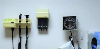 a white wall with a bunch of electrical equipment on it
