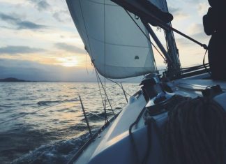 Advantages of Sailing Along the Coast of Ischia and Capri white sailing boat on body of water