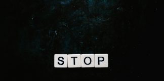 stop text with black background