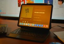 Best Premium Portable Monitors Above $250 a laptop computer sitting on top of a wooden desk
