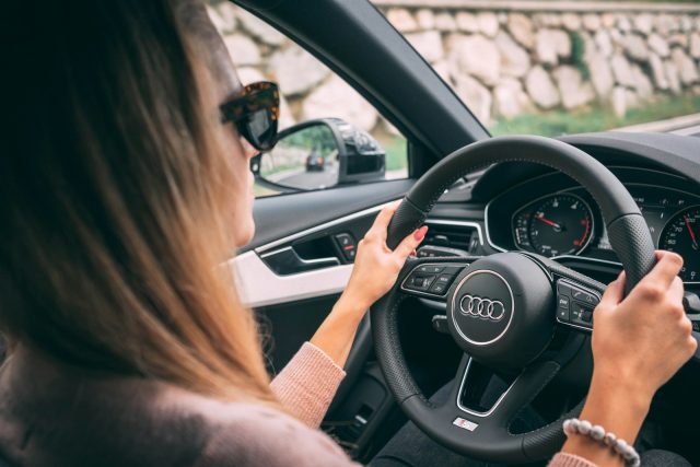Photo by Andraz Lazic woman driving car