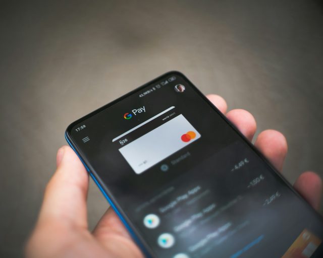 Photo by Mika Baumeister black samsung android smartphone displaying icons