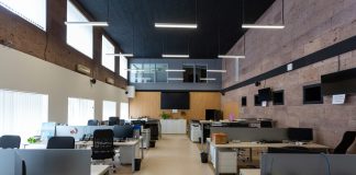 black flat screen computer monitor on white wooden desk