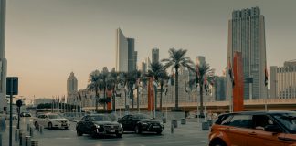 cars on road near buildings during daytime