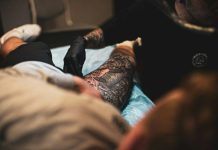Choosing the Right Laser Tattoo Removal Clinic in Vancouver person in brown pants and black leather shoes