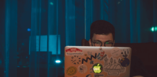 Man scanning the best live casinos featured by Nightrush