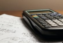 Quickly Convert Between Temperature Units for Engineering Use a calculator sitting on top of a piece of paper