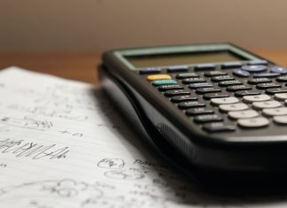 Quickly Convert Between Temperature Units for Engineering Use a calculator sitting on top of a piece of paper