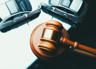 What Is Premises Liability Pre-Settlement Funding and How Does It Work? brown wooden car steering wheel