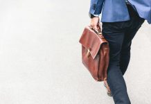 How Can An Estate Attorney Make a Difference for Families person walking holding brown leather bag