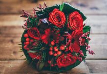 How to Choose the Perfect Flowers to Send for Every Occasion red flower bouquet on brown surface