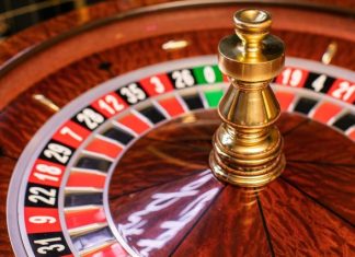 Roulette Mistakes Beginners Always Make A roulette wheel with a gold ball on top AI-generated content may be incorrect.