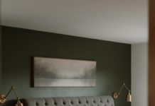 The Hidden Superpowers of Headboards: Storage, Soundproofing, Statement Design A modern bedroom with a tufted headboard and art.