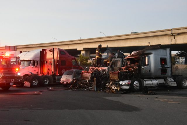 Photo by Bill Aboudi a bunch of trucks that are parked in a lot