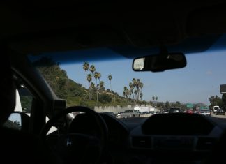 A view of a highway from inside a car
