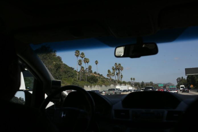 A view of a highway from inside a car