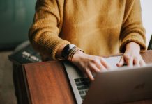 Headlines That Hook: Write Click-Worthy Titles Every Time person using laptop computer