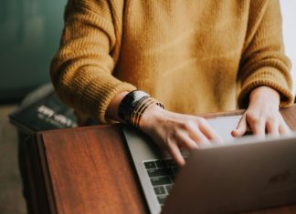 Headlines That Hook: Write Click-Worthy Titles Every Time person using laptop computer
