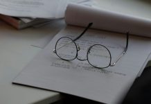 The Importance of Evidence and Documentation in Work Injury Cases black framed eyeglasses on top of white printing paper