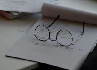 The Importance of Evidence and Documentation in Work Injury Cases black framed eyeglasses on top of white printing paper