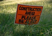 What Are the Most Common Types of Construction Accidents in New York? a sign in the grass