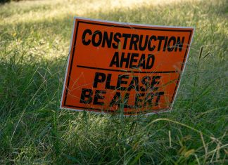 What Are the Most Common Types of Construction Accidents in New York? a sign in the grass