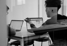 3 Cybersecurity Challenges Creative Agencies Don’t Talk About Enough man using MacBook