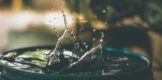 water drop on bucket photo