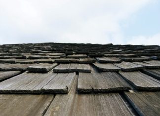 The ROI of Replacing Your Roof in Wisconsin a roof with shingles