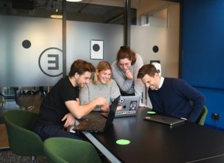 people sitting on chair in front of laptop computers