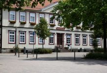 5 Ways Extra-Curricular Programs Enrich Swiss Boarding Education Traditional timber-framed building with white windows.