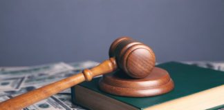 brown wooden chess piece on brown book