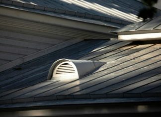 Metal roof with a ventilation vent