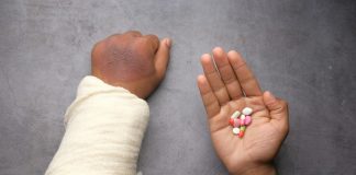 person holding babys hand