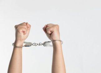 person showing handcuff