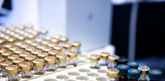 brown and white chess pieces on white tray